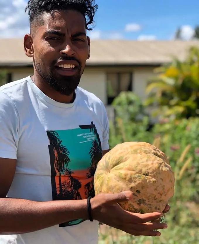 Roy Krishna with produce from his backyard garden in Ba. Photo: Naziah Ali