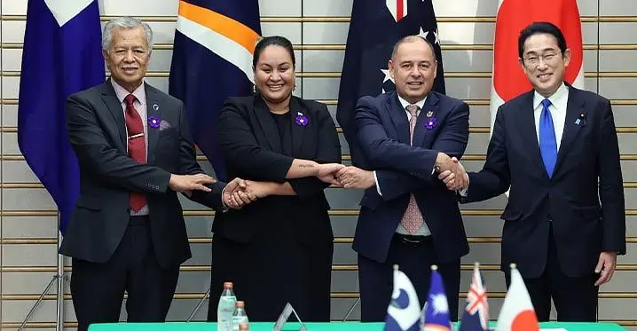 From left: Pacific Islands Forum secretary-general Henry Puna, Marshall Islands Foreign Minister and chief negotiator Kitlang Kabua, Prime Minister of the Cook Islands Mark Brown, and Japanese Prime Minister Fumio Kishida at a meeting of Pacific Island Forum in Tokyo. Photo: RNZ Pacific