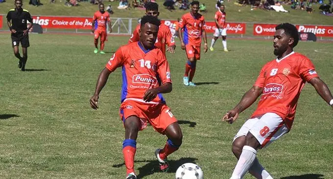 Rewa striker Setareki Hughes (right) in control as Navua defender Mosese Vonovono closes in during the Punjas Battle of the Giants tournament at Churchill Park, Lautoka on August 9,2020.  Photo: Waisea Nasokia