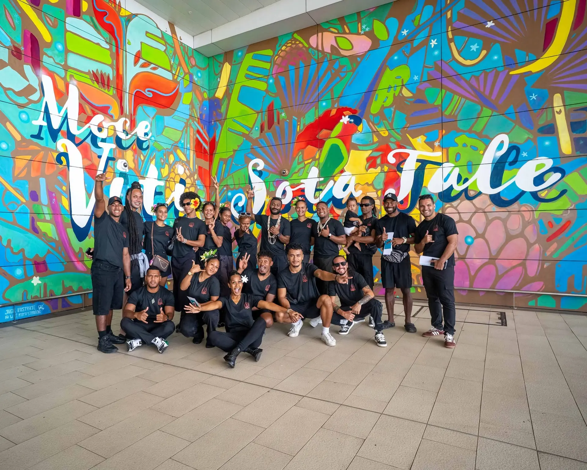Yosvel Guerrero, far right of the front row (crouching) with Fijian Flying Circus cast and crew at Nadi International Airport before departing for a tour of New Zealand in February 2026.