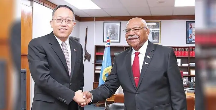 Chargé d'Affaires (CDA) ad interim Mr. Wang Xuguang of the Embassy of the People’s Republic of China with the Prime Minister and Minister for Foreign Affairs, Honourable Sitiveni Rabuka. Photo: DEPTFO