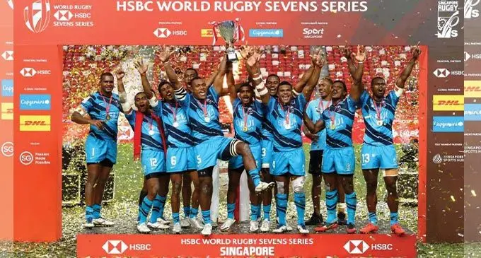 Fiji Airways Fijian 7s players with the Singapore 7s title on April 10, 2022. Photo: World Rugby