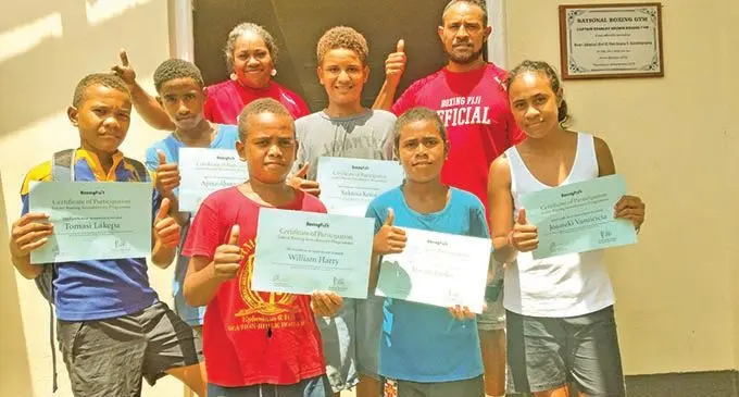 Back (from left) Ana Ledua, Elia Vuwai and Kaiafa Ledua. Front, Tomasi Lakepa, Samu Niudamu, William Harry, Kavaia Jitoko and Talei Ledua with their certificates at the Cdr Stan Brown Boxing and Fitness Centre, Walu Bay, Suva on January 15, 2021. Photo: Simione Haravanua