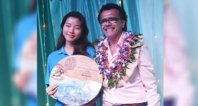 International School Nadi Dux Reina Arai receives her award from the school board truestee and Rosie Holidays and Ahura Resorts Fiji Managing Director Tony Whitton at the International School Nadi End of Year Awards at the Sofitel Fiji Resort and Spa in Nadi on December 6, 2022. Photo: Salote Qalubau