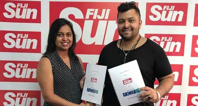 Fiji Sun general manager Advertising and Business Development Rachna Lal with Fashion Council of Fiji chairman Faraz Ali after signing the agreement. Photo: Maraia Vula