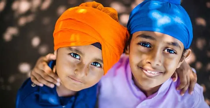 Children of the Sikh community Abijeet Singh, 7, (left) and Simran Kaur, 5, during the Sikh Gurudwara centennial celebration in Samabula on November 19, 2023. Photo: Leon Lord