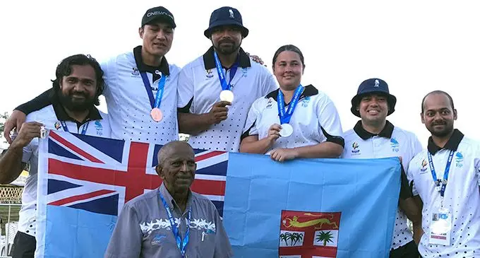 Team Fiji Archers Robert Elder,  Lisa and Fredrick Leota and their medals with officials. Photo: Rosi Doviverata