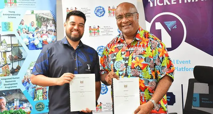 TicketMax’s founder George Fong with Deputy Prime Minister and Minister for Trade Manoa Kamikamica during the $30,000 grant handover ceremony at Ministry of Trade headquarters in Suva on December 13, 2023. Photo: Ministry of Trade