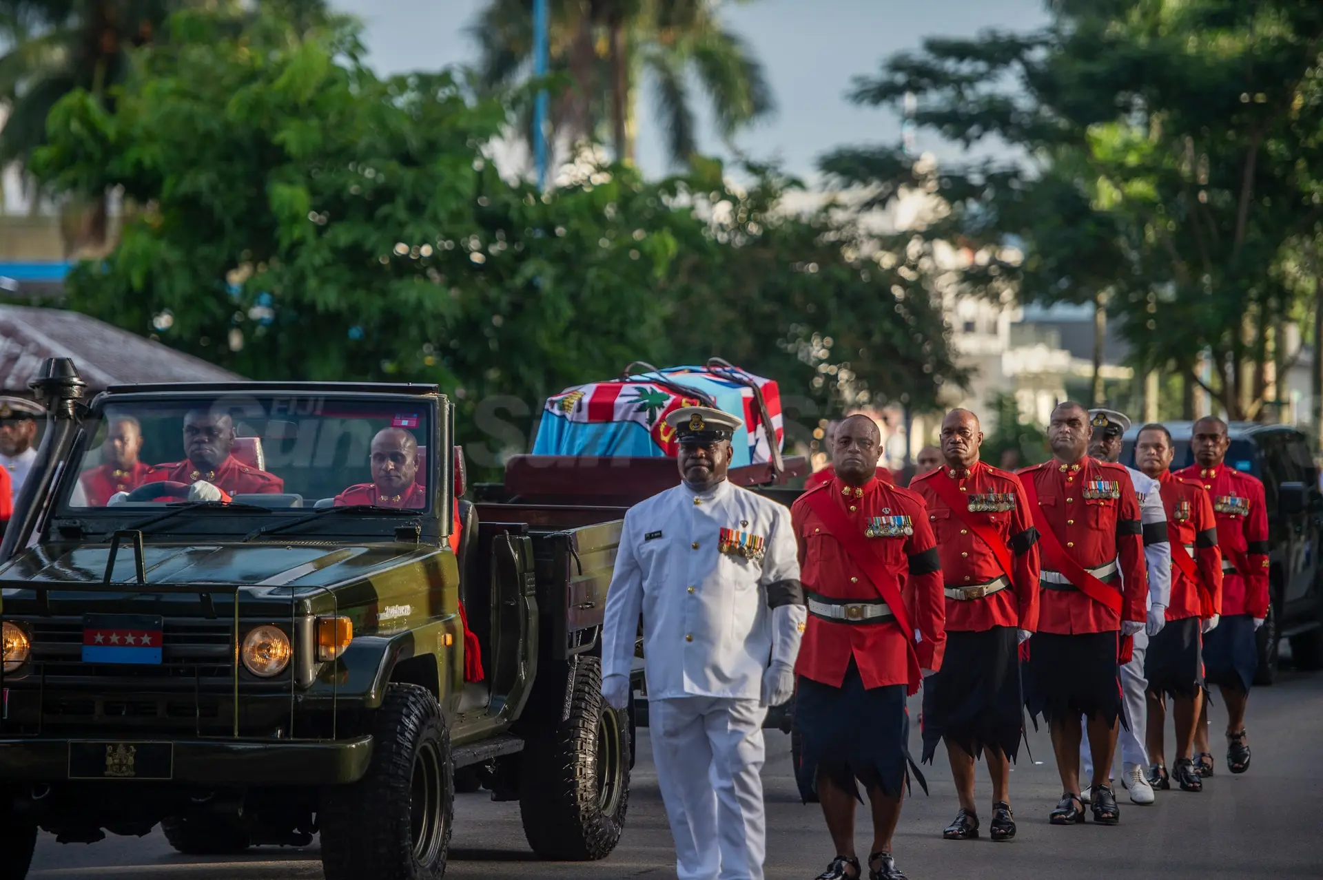 The funeral procession of the former President Ratu Epeli Nailatikau makes its way through the city of Suva to the State House.
