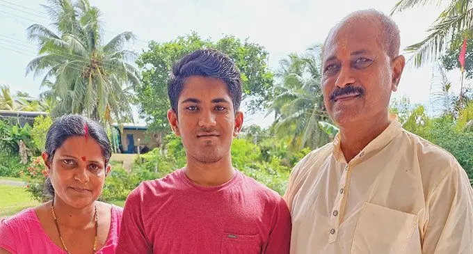 Parikant Shivom Shandil.(Middle) with parents Kusum and Harish at their home in Rara Housing Lajonnia Labasa, Photo: Sampras Anand 