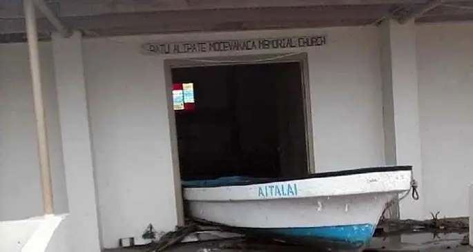 A fibreglass boat at the entrance of the Methodist Church in Yaroi Village, Matuku, Lau after TC Harold struck.