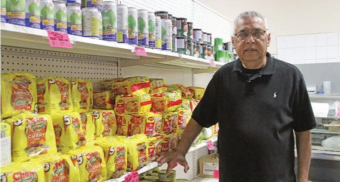 Harry Prasad inside his shop, Island Town Foods Enterprises Ltd in Vancouver, British Columbia, Canada. Photo: Selita Rabuku.