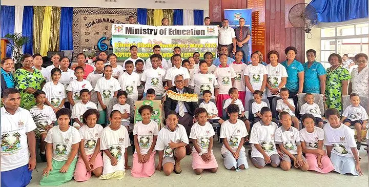 Assistant Minister for Education Iliesa Vanawalu (middle), with students and parents at the launch of the Ministry of Education Climate Change Awareness Week at Suva Grammar School in Suva, on April 7, 2025. Photo: Rariqi Turner