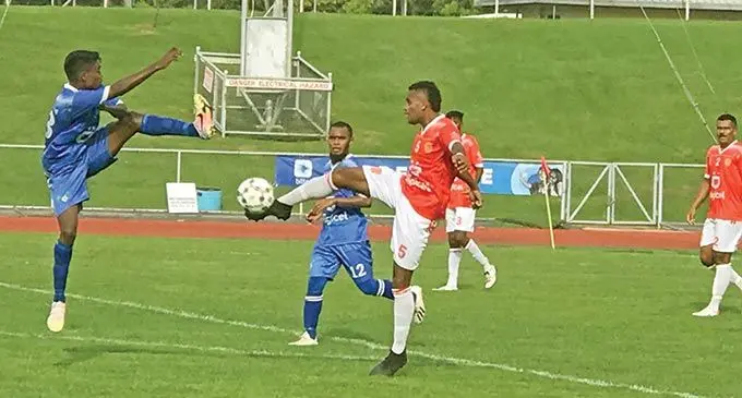 Rewa midfielder Patrick Joseph (right) clears the ball away from Muni Shivam Naidu of Lautoka in their Digicel Premier League clash at Churchill Park, Lautoka, on May 1 , 2022. Rewa won 2-0 to move into second place on the points table. Photo: Waisea Nasokia