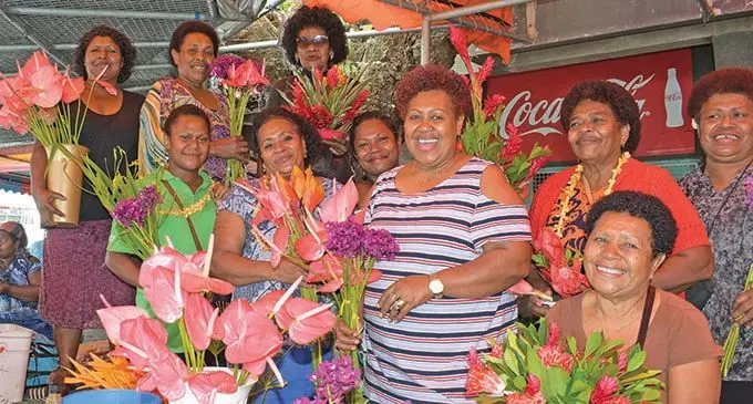 Suva Market flower stall owners all smiles after receiving a $10,000 order for flowers from movie makers  on November 28, 2019. Photo: Ronald Kumar
