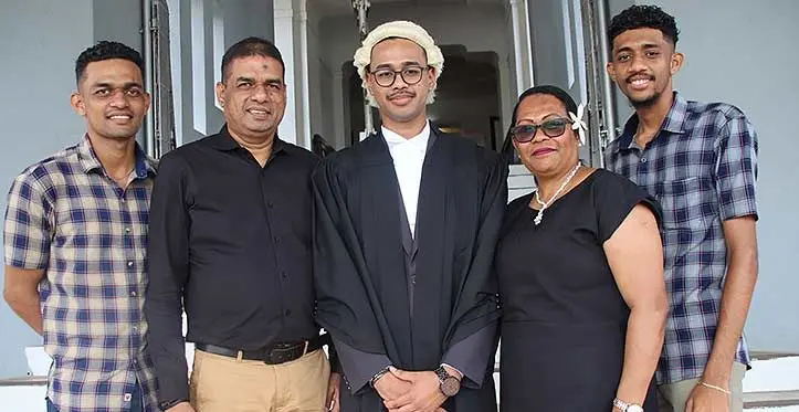 Joshua Francis Prasad (middle), with his family at the Fiji National University bar admission on November 7, 2023. Photo: Asenaca Ratu