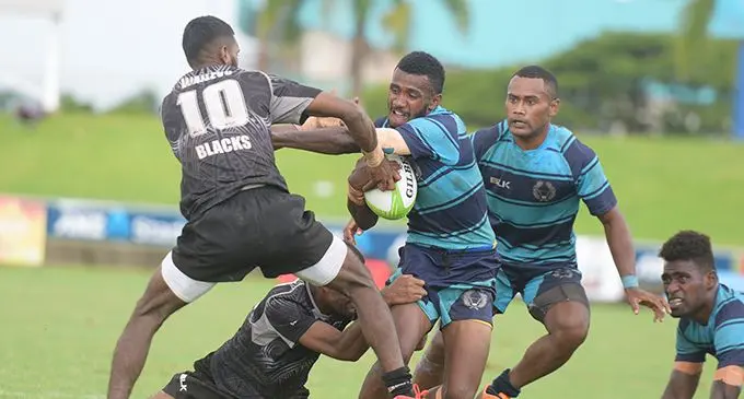 Wailevu Blacks defend against Caginiwasa in their Pool 7 clash of the Fiji Bitter Marist 7s at the ANZ Stadium, Suva on March 21, 2019. Wailevu Blacks coached by Tevita Tukania won 24-0. Photo: Ronald Kumar