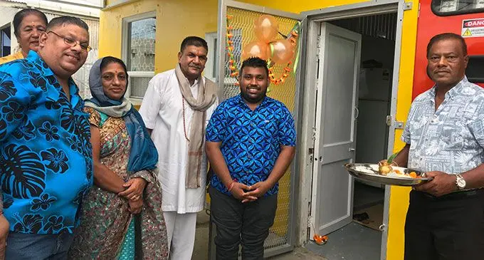 From left: Saten Kumar (father), Uma Chand(aunt), Kushna Devi (mother), pundit Rajesh Pande Maharaj, Om Prakash Kumar, Satish Chand(uncle) after the religious rituals for the opening of OM’s Kitchen at Ackland Street, Vatuwaqa, on March 24,2022. Photo: Laisa Lui.