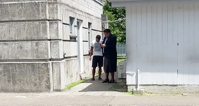 The Attorney-General’s personal staff officer (PSO) Sefanaia Sukanaivalu with robbery accused Samuela Dinati at the Magistrates Court in Suva on March 31, 2023. Photo: Ashna Kumar