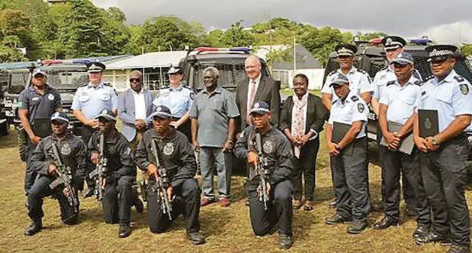 The guns and vehicles were welcomed by Manasseh Sogavare at a ceremony in Honiara. Photo: Australian Federal Police/RSIPF