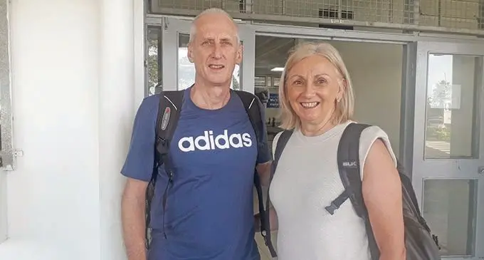 Fijian Pearls head coach, Jenny Brazel (right) with husband, David, after their arrival at Nausori International Airport on March 8, 2021. Photo: Sereana Salalo