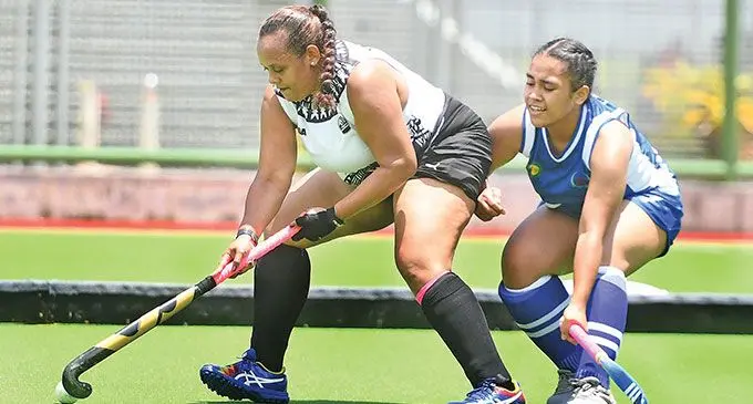 Fiji''s Tessa-Maree Heritage on attack against Samoa's Elisapeta Teo during the Oceania Pacific Cup tournament at the National Hockey Centre in Suva on December 9, 2024. Photo: Ronald Kumar
