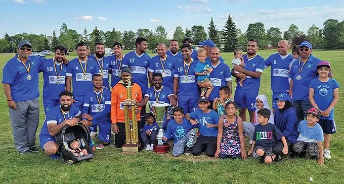 The champion Edmonton Lautoka soccer team and familiy members celebrate their spoils from last year’s IDC and BOG wins.