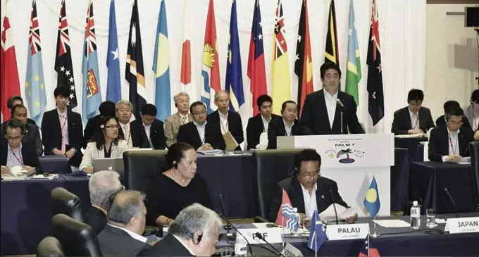 Japanese Prime Minister Shinzo Abe speaks at the Japan Pacific Islands Leaders Meeting (PALM7) in 2015