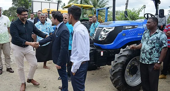 Acting Prime Minister and Attorney-General Aiyaz Sayed-Khaiyum (left) meets Ashish Sharma of International Tractors Limited India and  Carmart Limited Managing director Rakesh Kumar (third from left)  while Mr Saiyed-Khaiyum launches Sonalika Tractors at Waila in  Nausori on November 30, 2019.  Photo: Ronald Kumar