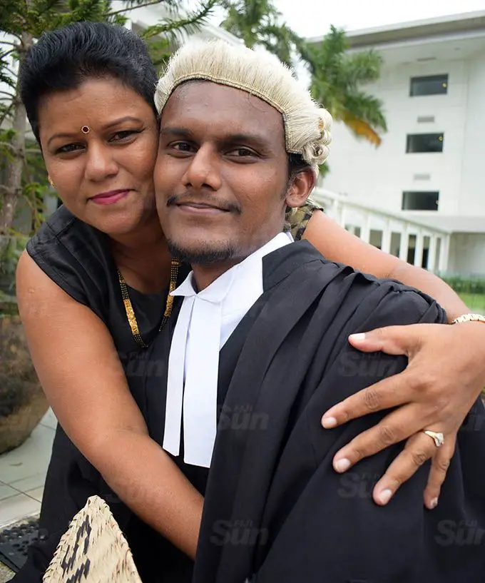 Anita Singh congratulate her son, Sidhant Singh following his admission into the Bar by Acting Chief Justice Kamal Kumar at Grand Pacific Hotel on March 12, 2021. Photo: Ronald Kumar.