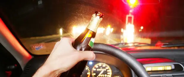 Drunk-driving-w-bottle-1