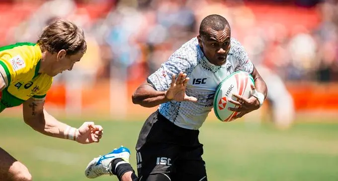 Fiji Airways Fijian 7s speedster  Alosio Naduva  fends of an Australian  defender  on February 3,2019.   Photo: Bruce Southwick/Zoom Fiji