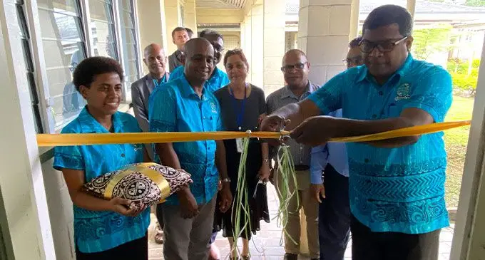 Minister for Agriculture Mahendra Reddy opens the new molecular laboratory, funded at Koronivia on July 13, 2022. Inset: Inside the laboratory. Photo: Josefa Babitu
