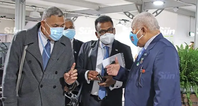 Prime Minister Voreqe Bainimarama, with Fijian High Commissioner to the UK Jitoko Tikolevu (left), and Permanent Secretary in the Prime Minister’s Office Yogesh Karan in Glasgow.  Photo: Rosi Doviverata