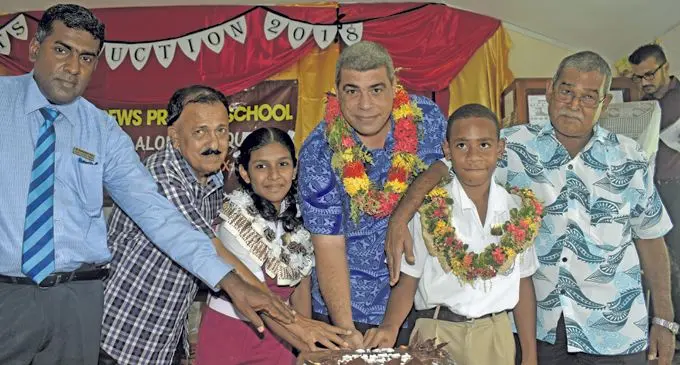 head teacher Dharmendra Reddy, Mohammed Sattar, head girl Drishti Lata, Chief guest, Divisional Education Officer (west) Josefa Gavidi, head boy Viliame Saukuru and Rajend Kuamr at the prefect’s induction ceremony yesterday. Photo: WAISEA NASOKIA
