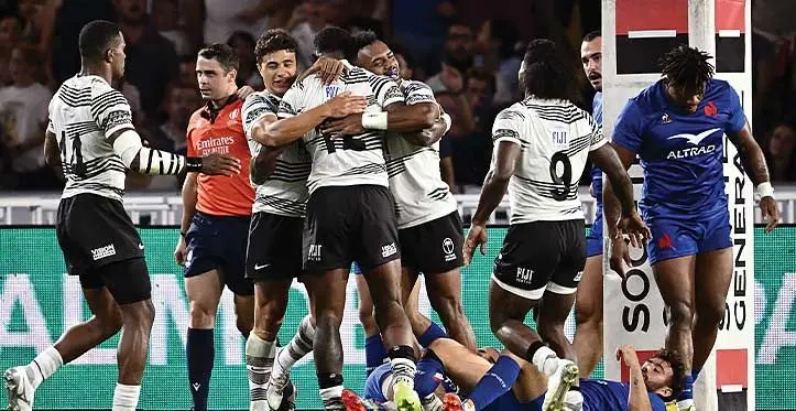 Jiuta Wainiqolo (from left), Caleb Muntz, Sireli Maqala and Frank Lomani celebrate Semi Radradra’s try against France. Fiji lost 17-34. Photo: AFP