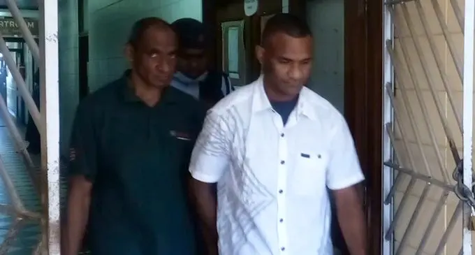 (Right) Alivereti Lesukiyasawa is escorted out of the High Court in Lautoka on July 19,2022. Photo: Salote Qalubau
