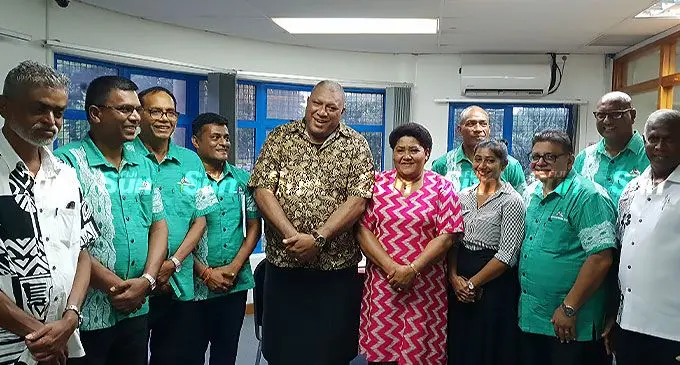 President, Ratu Wiliame Maivalili Katonivere (fifth from left), with his wife and First Lady, Filomena Katonivere (sixth from left), with the board of directors and management, the Assistant Minister for Agriculture, Viam Pillay (first from left) and the Assistant Minister for Sugar, George Vegnathan (right) in the SCGF newly renovated boardroom and training centre in Lautoka on March 28, 2022. Photo: Nicolette Chamber