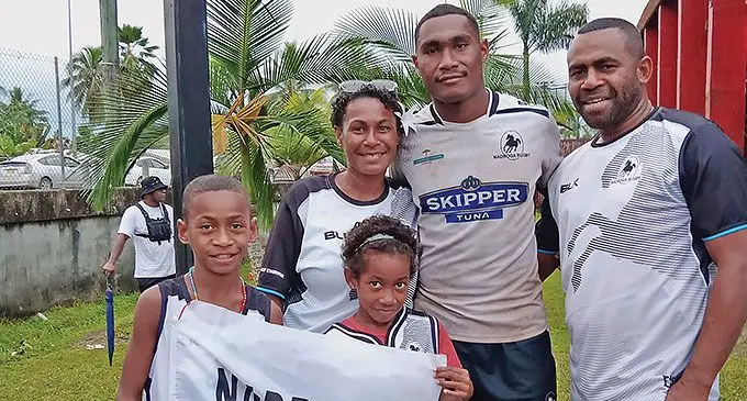 BLK Nadroga rookie flyhalf Joeli Baleilevuka alongside his family members at Ratu Cakobau Park, Nausori after their 21 - 17 Skipper Cup win against Naitasiri last weekend.