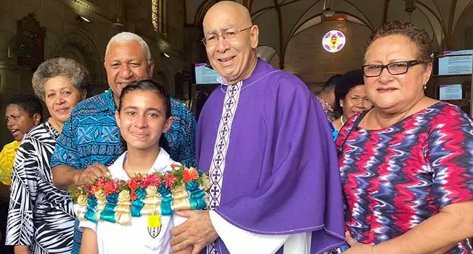St Anne’s Primary School deputy head girl Emmalyne Whippy with grandparents (from left): Lavenia Whippy, Prime Minister Voreqe Bainimarama, Mary Bainimarama, along with Father Dan Sinclair at the Sacred Heart Cathedral during the prefects induction ceremony of St Anne’s Primary School.