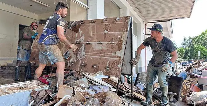 Recovery...Fijians who helped in cleaning the Koori Mail office.