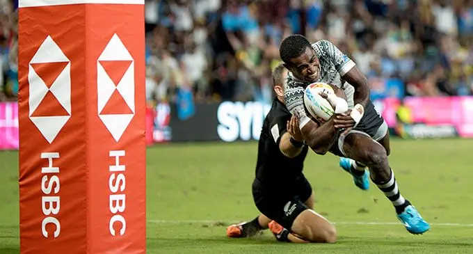 Fiji Airways Fijian 7s winger Aminiasi Tuimaba runs over New Zealand’s Kurt Baker to score the first of his two tries as they romped to a 26-5 win during the Sydney Sevens at the Bankwest Stadium in Australia on February 1, 2020. Tuimaba scored four tries in the first day of competition.  Photo: Bruce Southwick/Zoom Fiji