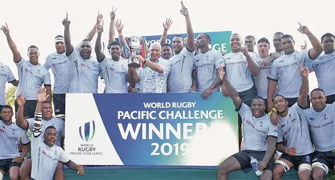 Swire Shipping Fijian Warriors players with Prime Minister Voreqe Bainimarama after winning the 2019 World Rugby Challenge at the ANZ Stadium, Suva on March 16, 2019. Photo: Ronald Kumar