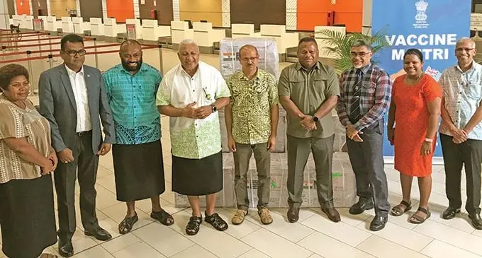 Prime Minister Josaia Voreqe Bainimarama (fourth from left), receives 100,000 doses of the COVID-19 vaccine AstraZeneca, (known in India as Covishield) from Government of India. Present at the arrival of the vaccines were the Acting High Commissioner of India to Fiji, Saifullah Khan (fifth from left), Minister for Health and Medical Services, Dr Ifireimi Waqainabete (third from left), Permanent Secretary for Health and Medical Services Dr James Fong (seventh from left), Minister for Defence and National Security is Inia Seruiratu (sixth from left) and others at the Nadi International Airport on March 29, 2021. The shipment arrived via Sydney on a Fiji Airways flight.  Photo: Waisea Nasokia