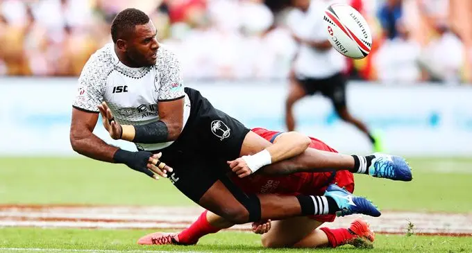 Fiji Airways Fijian 7s prop and Olympian Jasa Veremalua flicks a pass during the New Zealand Sevens in Hamilton where Fiji won their first torunament of the 2017/18 World Sevens Series. Photo: Zimbio
