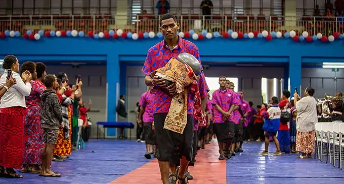 Marist U18 captain Benjamin Naivalu leading the team into the FMF National Gymnasium in Suva on October 22, 2022.Photo: Leon Lord