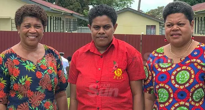 From left: Salanieta Rawaileba (widow of Private Rawaileba), Private Senigigea Rokosirinavosa (daughter of Private Rokosirinavosa), and Liku Veilewai (widow of Private Veilewai) at the memorial of the November 2, 2000, failed attempted mutiny at Queen Elizabeth Barracks in Nabua on November 2, 2020. Photo: Kelera Sovasiga