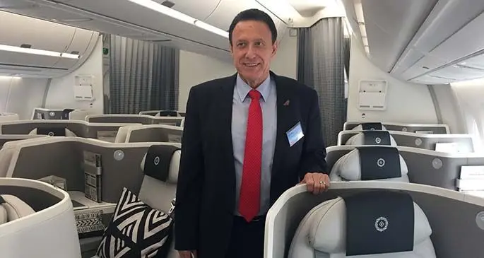 Fiji Airways chief executive officer, André Viljoen, inside the A350-900 XWB aircraft business class cabin.