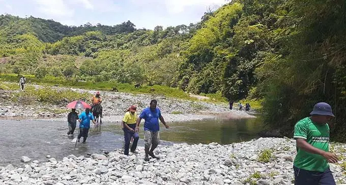 Provincial Administrator (PA) Naitasiri Mr. Koroka Baleiwai lead members of the joint Government team as they journey on foot to visit rural communities in the upper Wainimala areas.