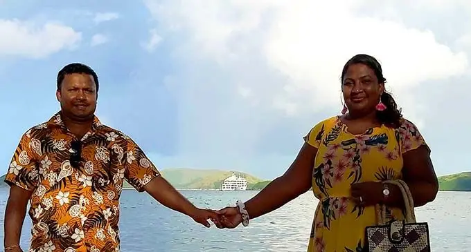 During a Captain Cook Cruise to the Yasawas: Couple Kavinesh Krishneel Gaunder and Roshika Ranjini Gaunder with the MV Reef Endeavour in the background. Roshika Ranjini Gaunder.
